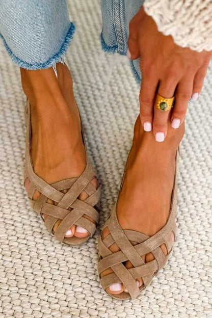 Open-toe flat sandals with crisscross woven straps