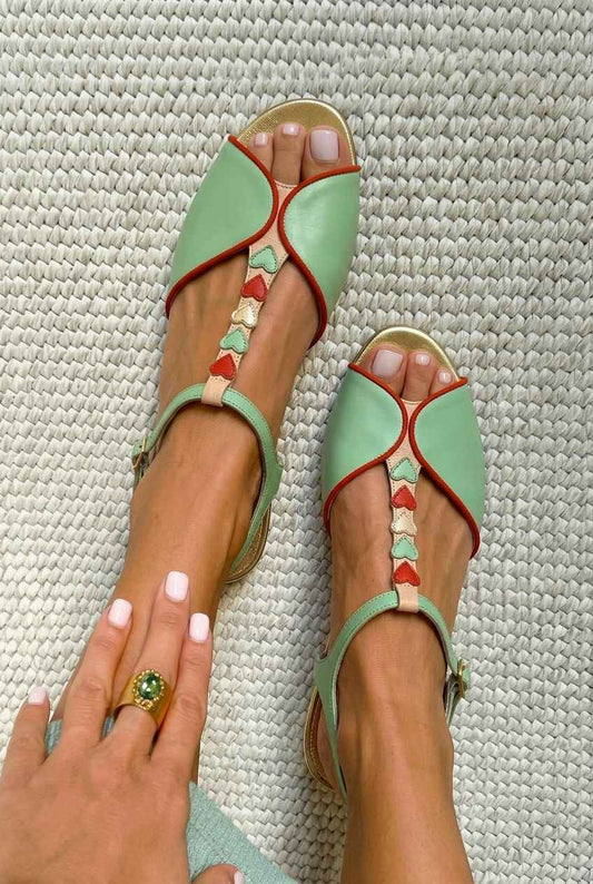 Low-heeled slingback peep-toe sandals with heart detail