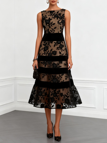 Solène | Black tulle trapeze midi dress with a floral print and sleeveless