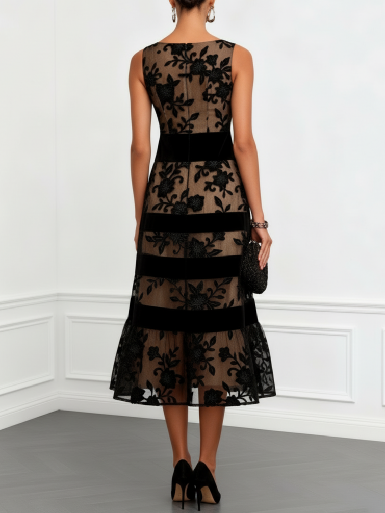 Solène | Black tulle trapeze midi dress with a floral print and sleeveless