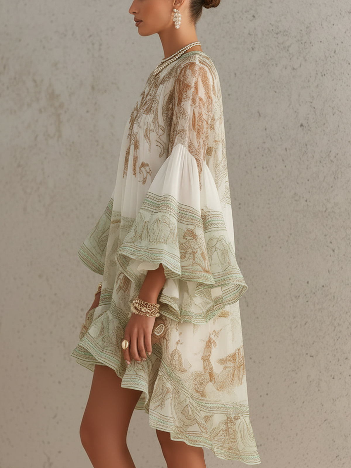 Solange | Short asymmetric green muslin dress with ruffles and bell sleeves