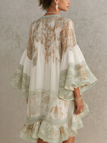Solange | Short asymmetric green muslin dress with ruffles and bell sleeves