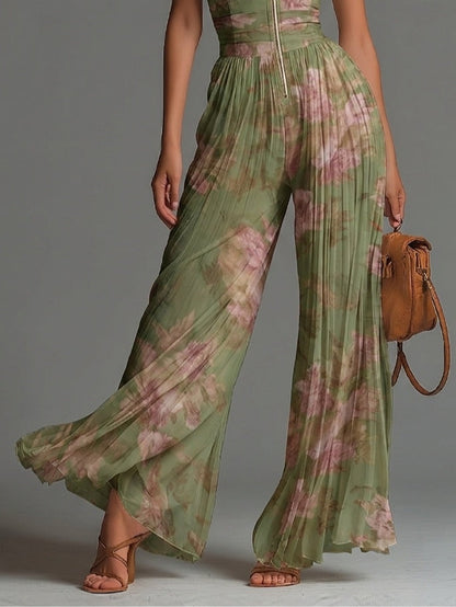 Charlotte™ | Fluid pleated jumpsuit with green flowers