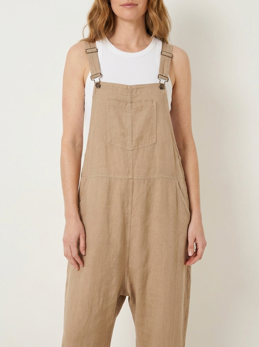 Beige linen dungarees, bib and strap detail