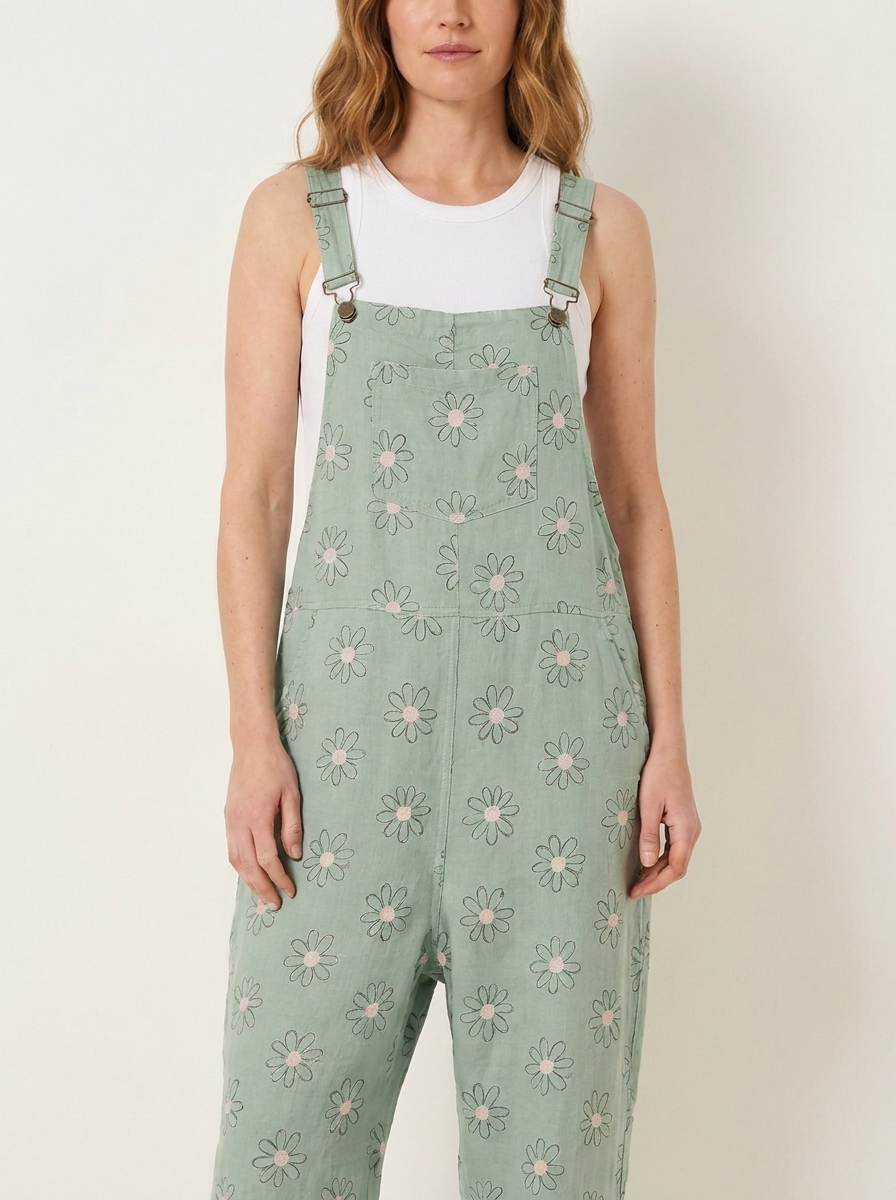 Mint daisy print linen dungarees, bib and strap detail