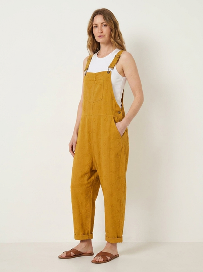 Yellow linen dungarees, three-quarter view