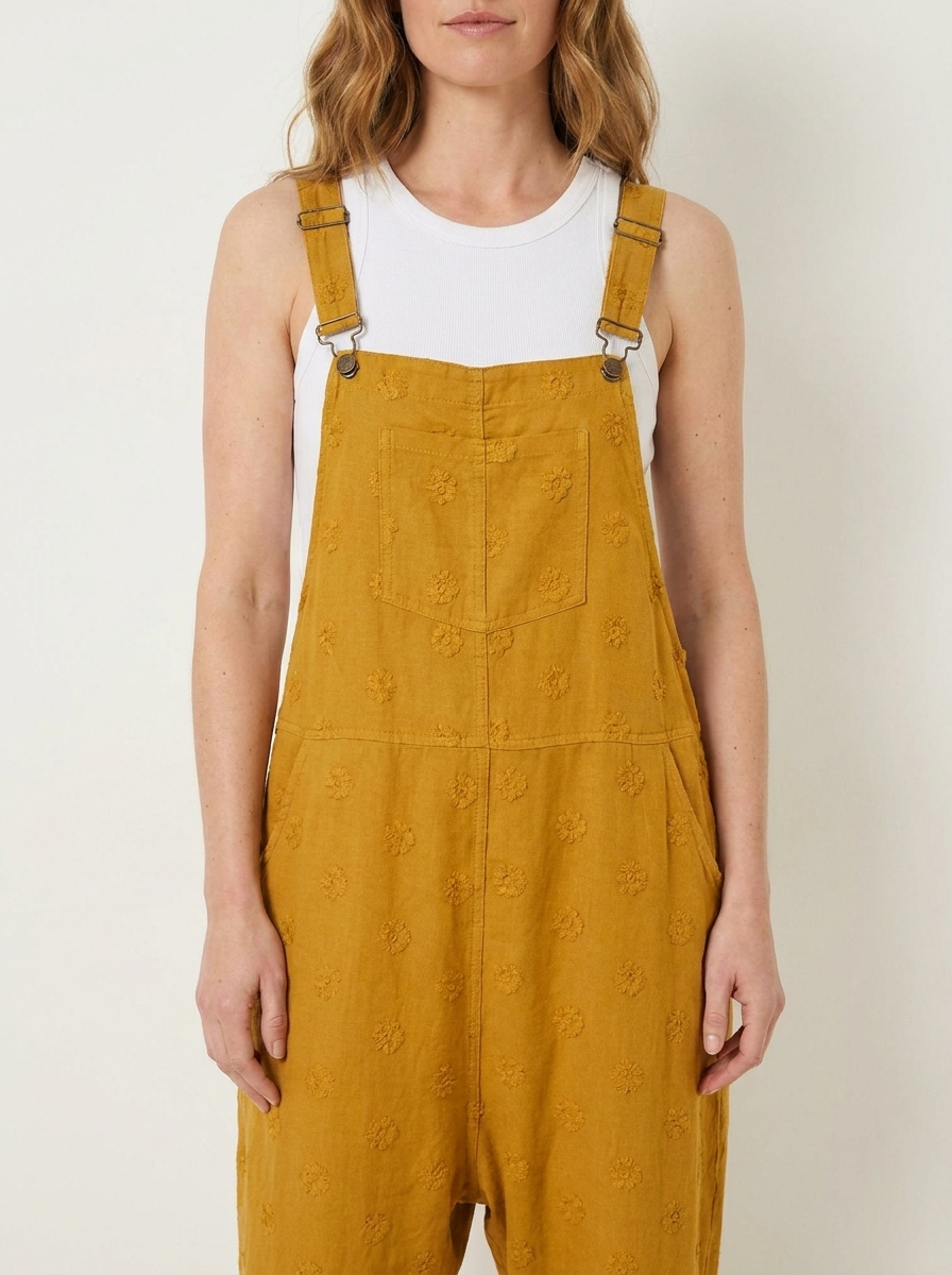 Yellow linen dungarees, bib and strap detail