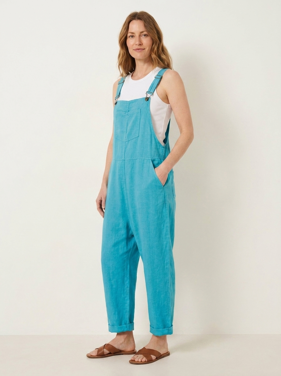 Turquoise linen dungarees, three-quarter view