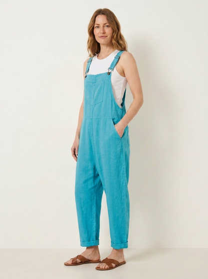 Turquoise linen dungarees, three-quarter view